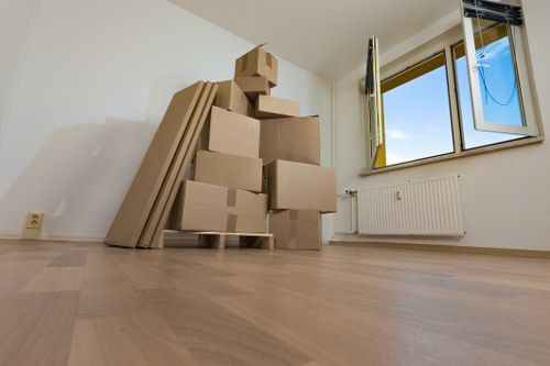 Packed boxes and furniture loaded into a moving van